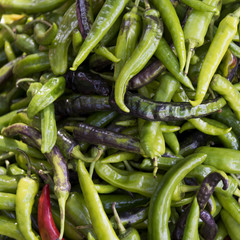 Close up of green chili peppers.