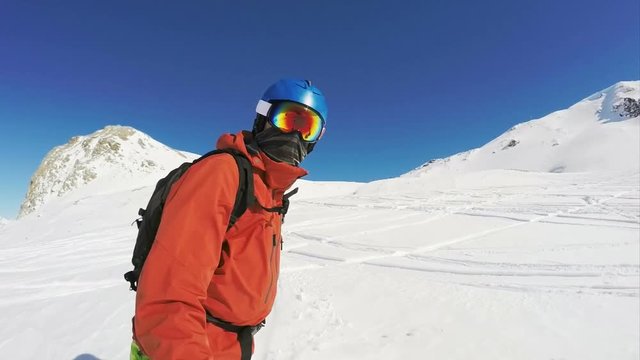 Snowboarding on a freeride, selfie stick view gimbal stabilized slow motion footage
