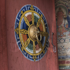 Door knocker on a Buddhist monastery, Bhutan, Asia.