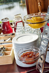 apricot and plum jam on a buffet table