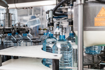 Water factory - Water bottling line for processing and bottling pure spring water into bottles.