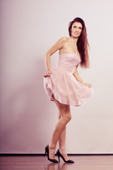 Naklejka premium woman in bright dress and high heels shoes
