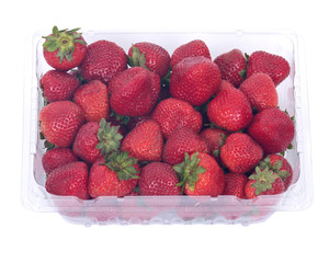 Fresh organic strawberries in plastic box separated on white background
