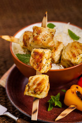 Chicken Kebab or Kabob Skewers with Rice. Selective focus. 