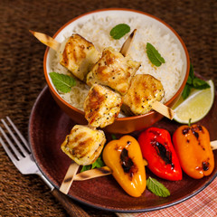 Chicken Kebab or Kabob Skewers with Rice. Selective focus. 