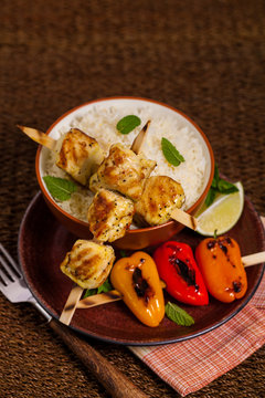 Chicken Kebab or Kabob Skewers with Rice. Selective focus. 