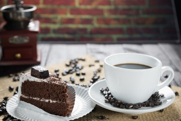Coffee cup and beans on a rustic background. Coffee Espresso and
