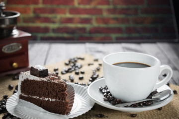 Coffee cup and beans on a rustic background. Coffee Espresso and
