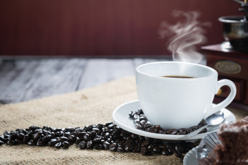 Coffee cup and beans on a rustic background. Coffee Espresso and