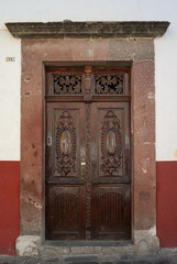 Fototapeta na wymiar Wooden doorway of a building, San Miguel de Allende, Guanajuato,