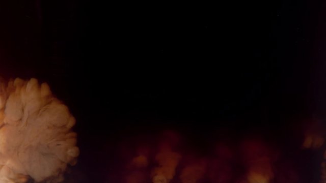 Coffee creamer swirling in coffee, shot with Phantom Flex 4K at 1000 frames per second