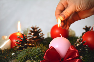 Lighting advent candles