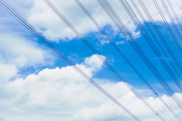 Fototapeta premium A power line on the blue sky.