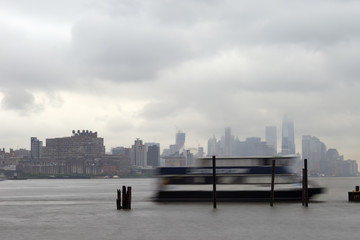 East River Ferry coming in for docking on a foggy day.