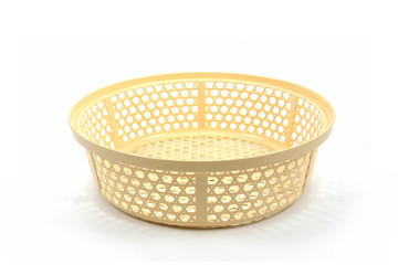 Small plastic basket on a white background