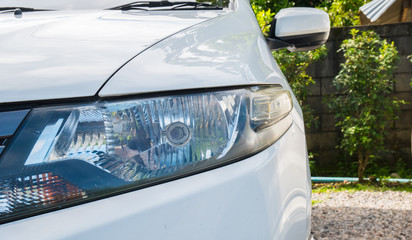 Fototapeta premium Close - up light car on the road