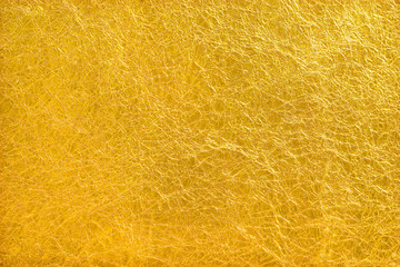Shiny yellow leaf gold foil texture background - obrazy, fototapety, plakaty