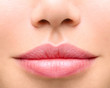 Young woman close up. Sexy plump lips