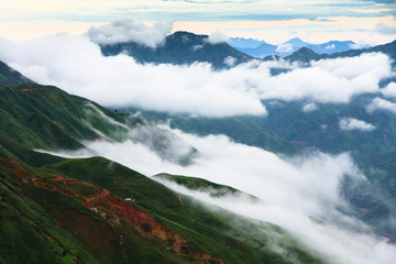 Beautiful landscape on the mountain above clouds