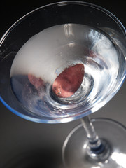 Martini cocktail isolated on black background. Shot from above,