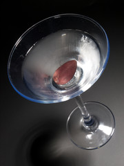 Martini cocktail isolated on black background. Shot from above,