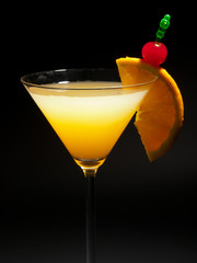 Cocktail Bronx with gin, vermouth and orange juice. Isolated on