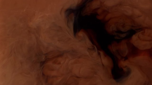 Coffee creamer swirling in coffee, shot with Phantom Flex 4K at 1000 frames per second