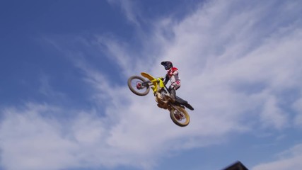 Motocross rider going off big jump