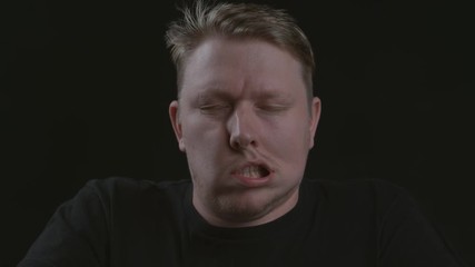 Man's face is blown in wind; shot on Phantom Flex 4K at 1000 fps