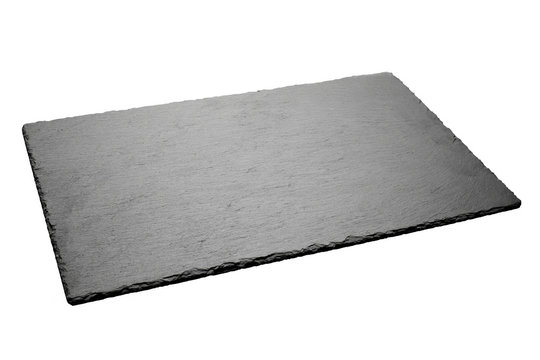 Empty black slate plate isolated on white background.