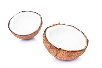 Closeup half of brown coconut shell on white background