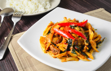 Thai food Stir fried pork and bamboo shoots with chilli curry served with rice