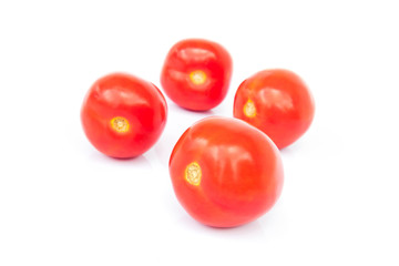 Closeup fresh red tomatoes on white background, food and vegetab