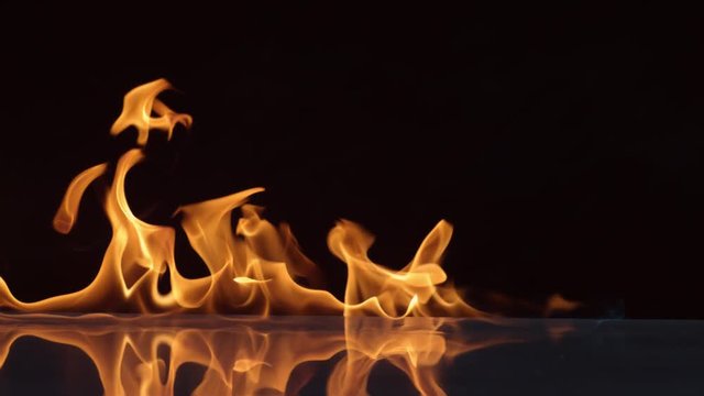Flames burning on black background in slow motion; shot on Phantom Flex 4K at 1000 fps