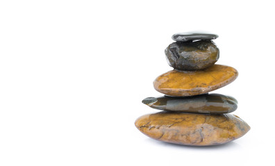 Pile of stones for spa relax on white background