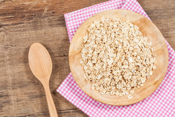 oats in plate on wood table