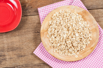 oats in plate on wood table
