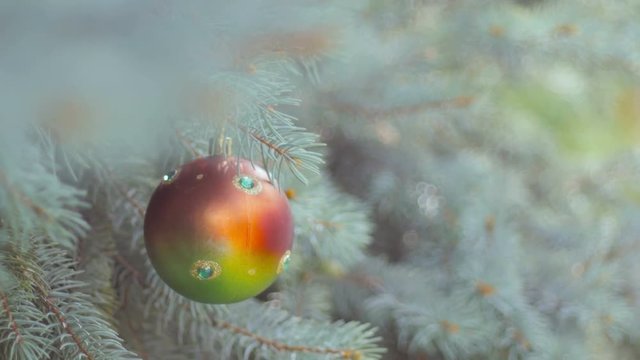 Decorated Christmas tree on blurred, sparkling and fairy background