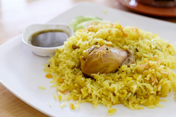 Rice with curried chicken biryani with sauce sweet and sour