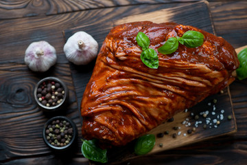 Fresh spiced pork knuckle ready to be cooked, selective focus