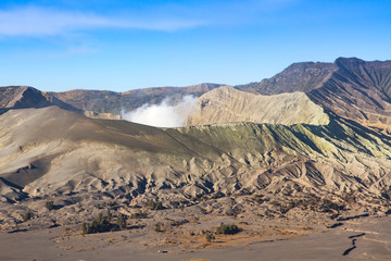 Fototapeta na wymiar Layer Volcanic ash as sand ground of Mount Bromo volcano the magnificent view of Mt. Bromo located in Bromo Tengger Semeru National Park, East Java, Indonesia.