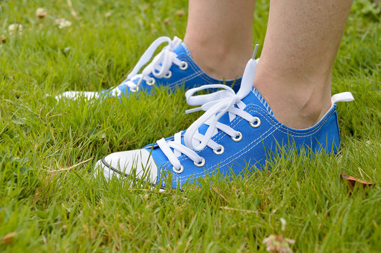 sneakers and grass