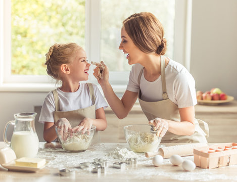 Mother and daughter baking