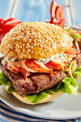 Bacon, lettuce and mayonnaise surf and turf hamburger
