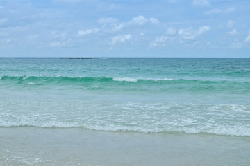 Fototapeta na wymiar Turquoise sea waves on Sai Kaew Beach at Rayong Thailand. beauti
