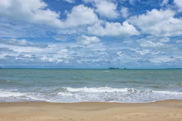 Fototapeta na wymiar Turquoise sea waves at Rayong Thailand. The beach for seating