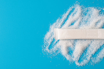 White Sugar Packets on a Blue background