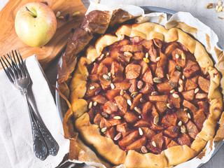 Apple galette with pine nuts. Top view