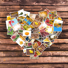 Autumnal photos heart collage, wooden planks background