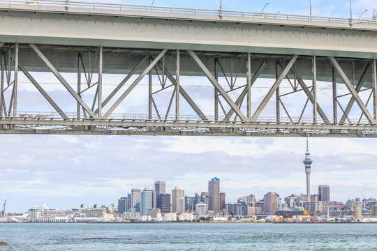 Fototapeta Auckland city and sky tower view from the Auckland harbor bridge